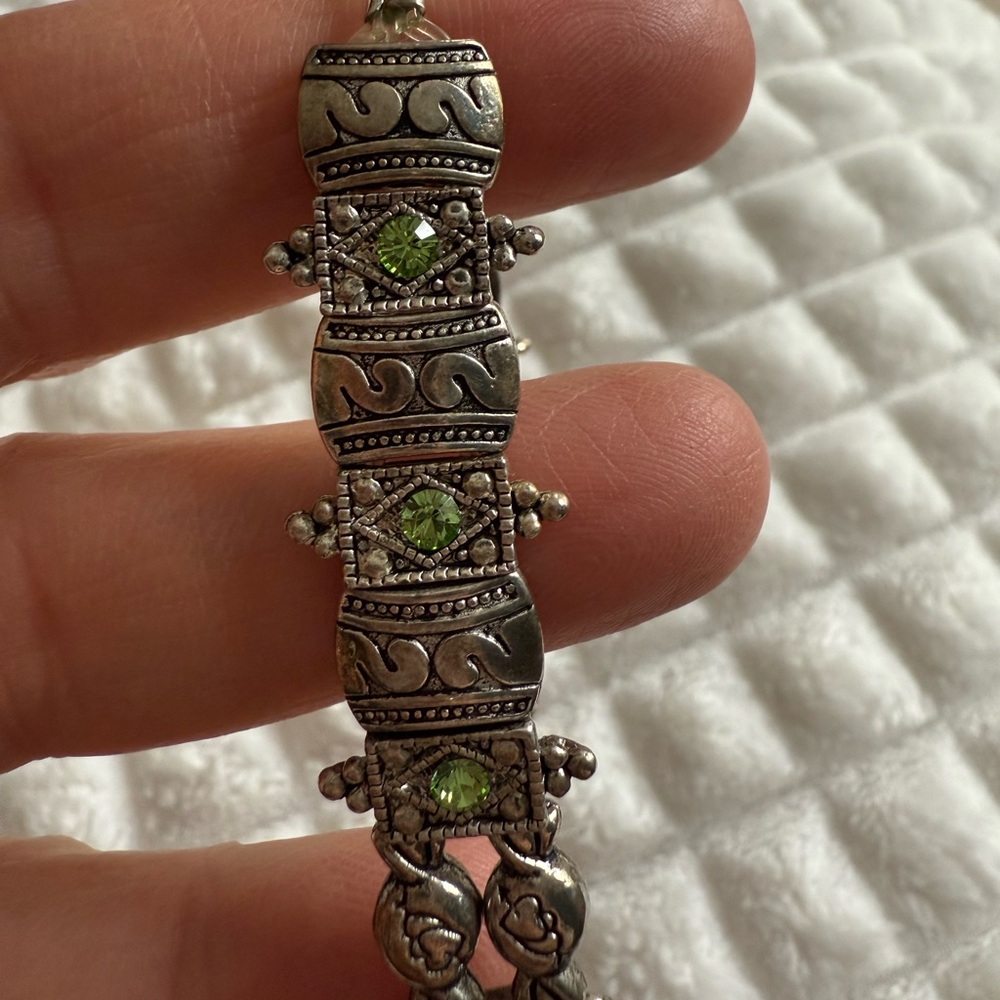 Intricate Silver and Green Gemstone Bracelet